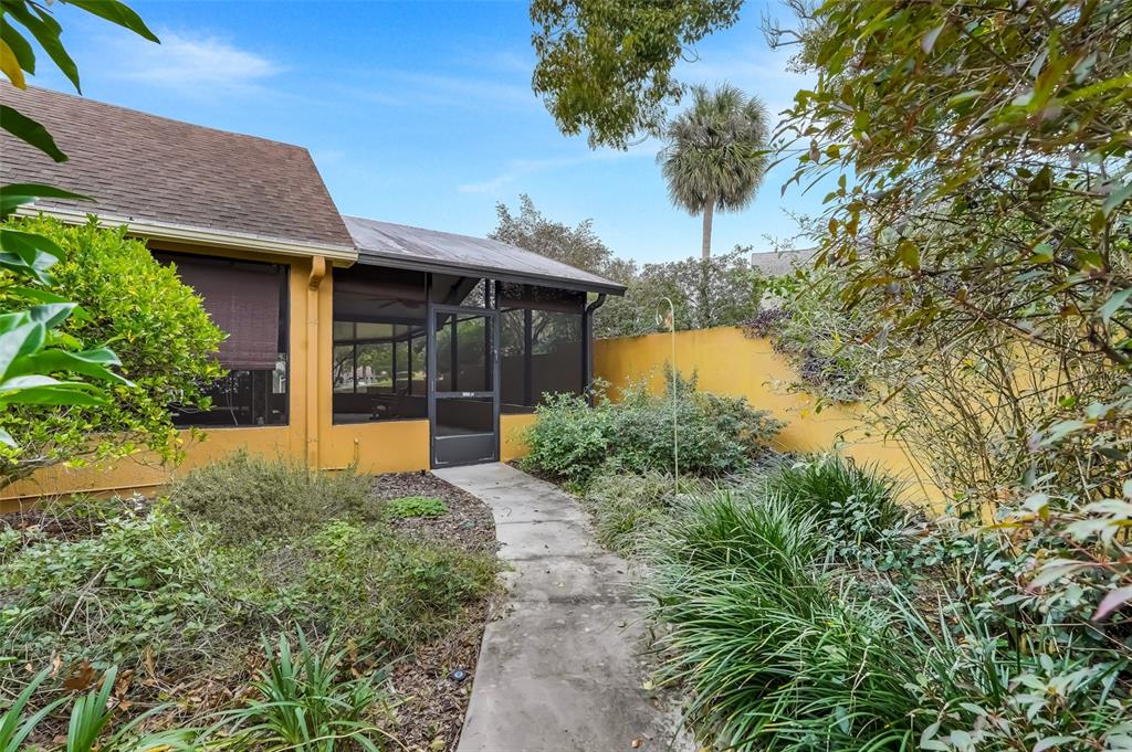 1207 Overlook Road Eustis, FL 32726 - Photo 32 of 44 a view of a house with garden