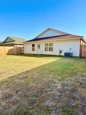 a front view of a house with yard