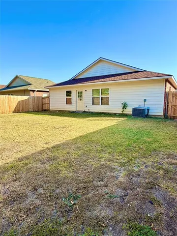a front view of a house with yard