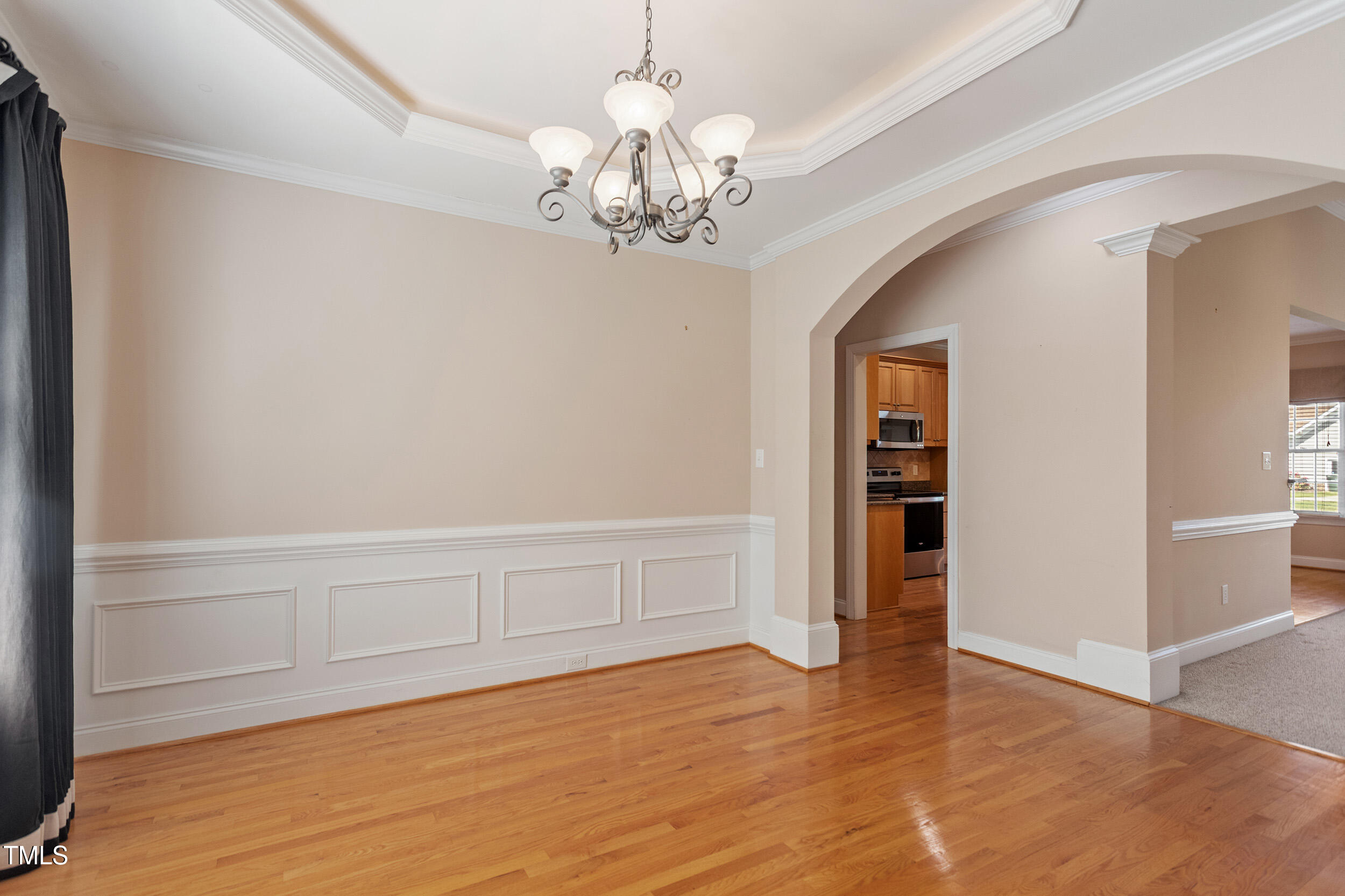 97 Rand Road Raleigh, NC 27603 - Photo 5 of 34 wooden floor in an empty room with a window