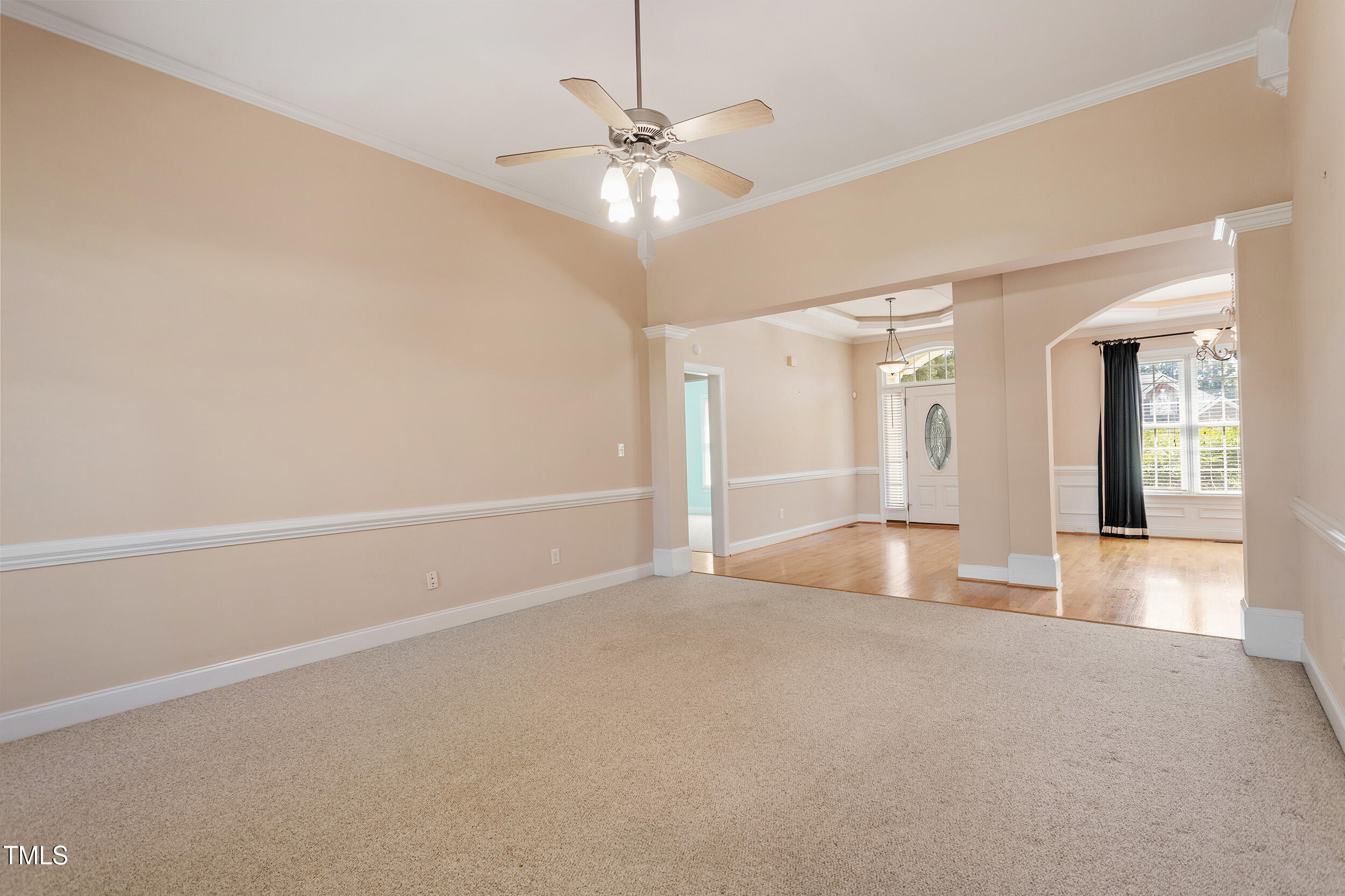 97 Rand Road Raleigh, NC 27603 - Photo 8 of 34 wooden floor in an empty room with a window