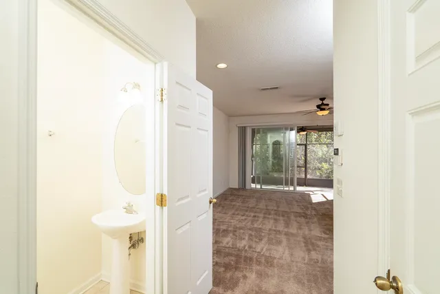 a view of a yard with cars