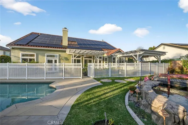 a view of a swimming pool with a lounge chair