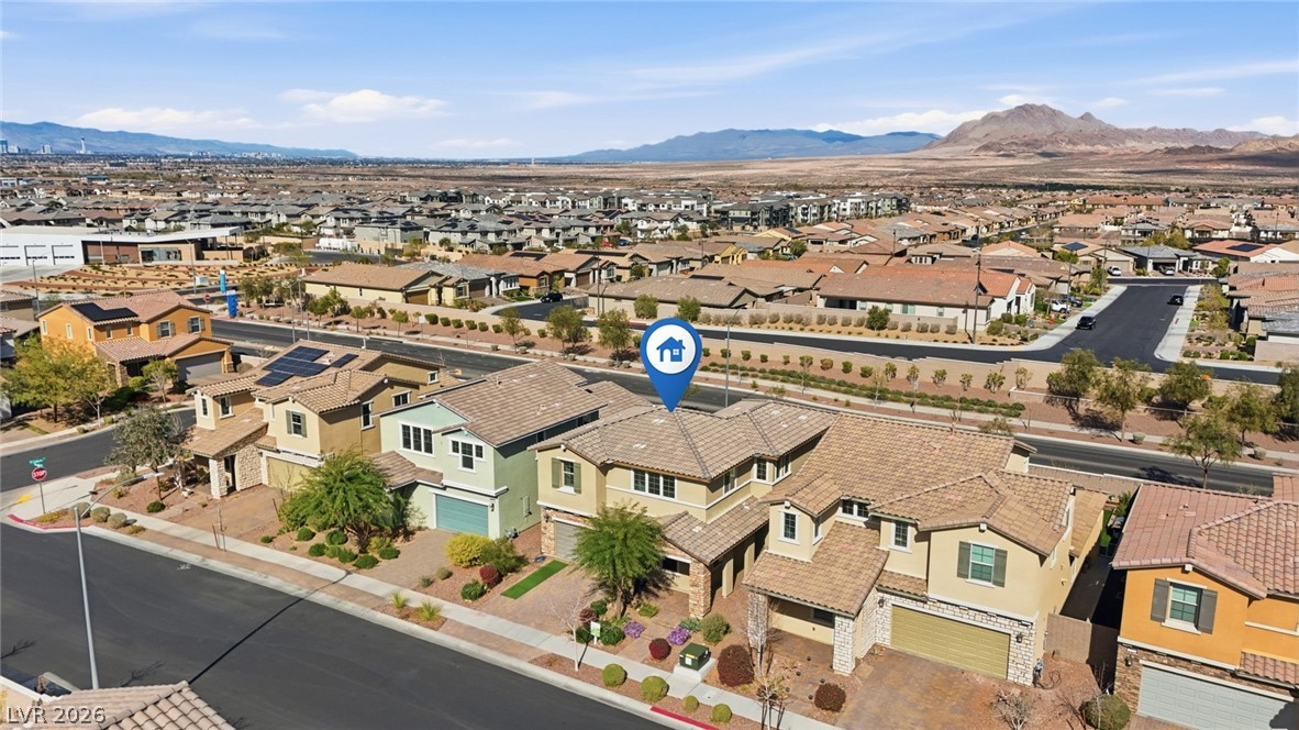 250 Dedication Avenue Henderson, NV 89011 - Photo 66 of 67 Aerial view of residential area featuring a mountain backdrop