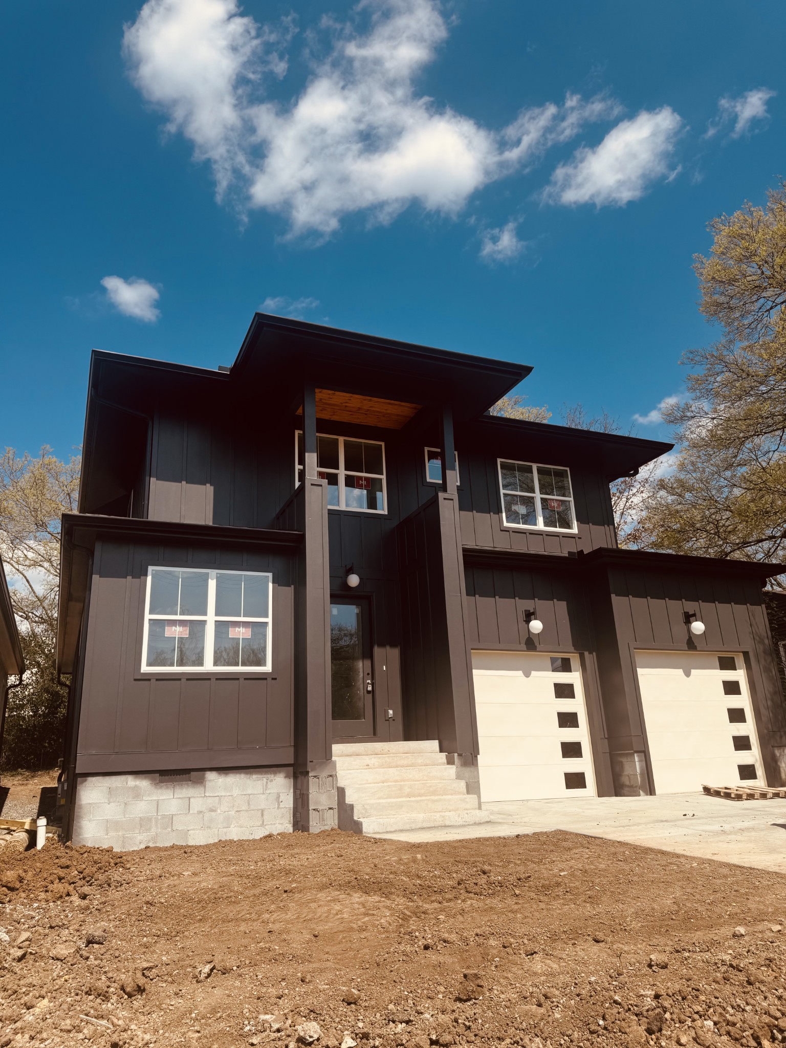 front view of a house with a yard
