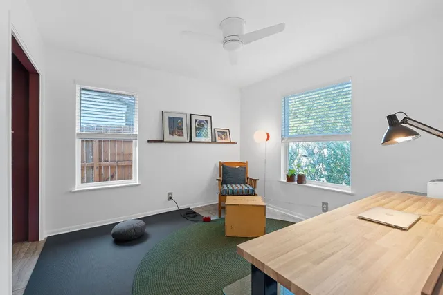 a room with furniture and a window