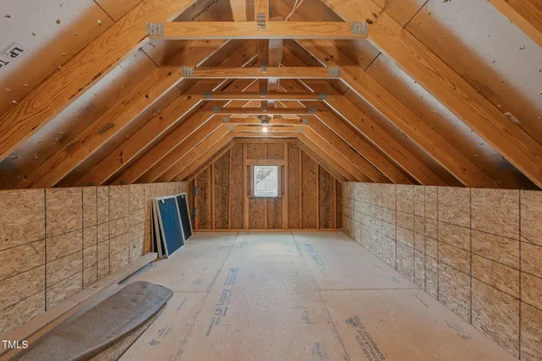 a view of a house with backyard and porch