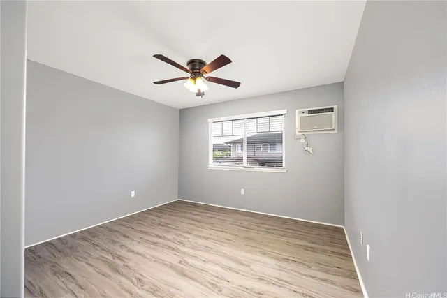 a view of small space with wooden floor