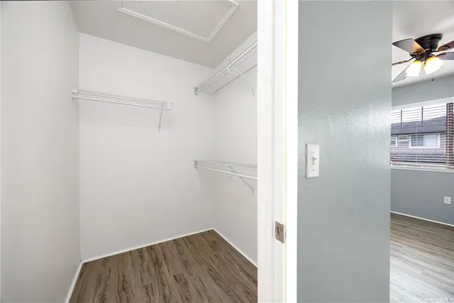 a bathroom with a double vanity sink toilet and shower