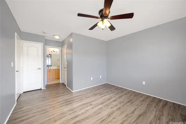 a bedroom with a bed furniture and a window
