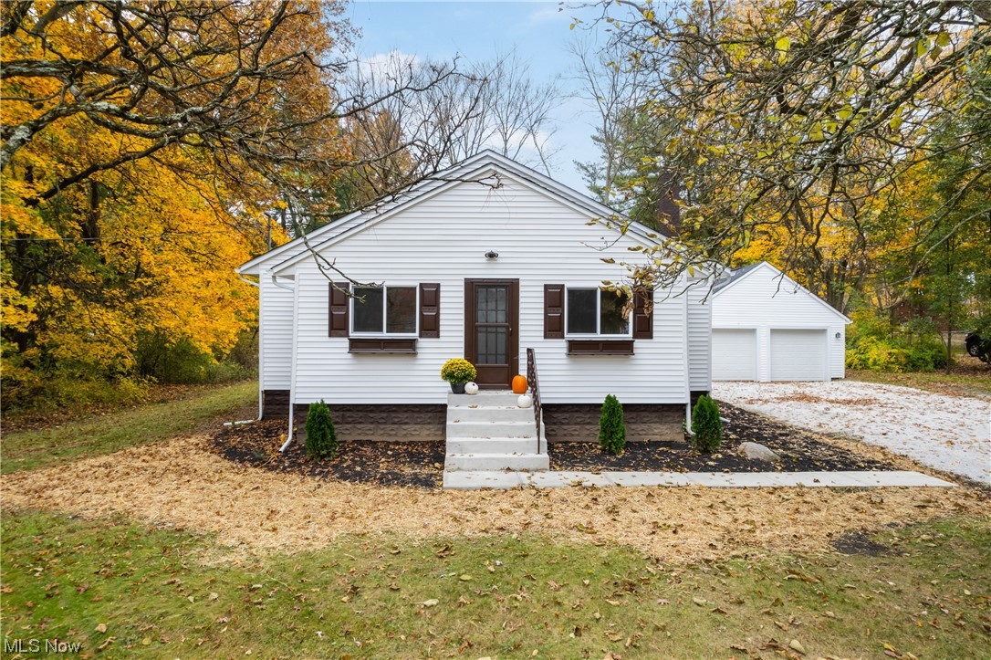 916 Renninger Road Akron, OH 44319 - Photo 2 of 31 View of front facade featuring a garage