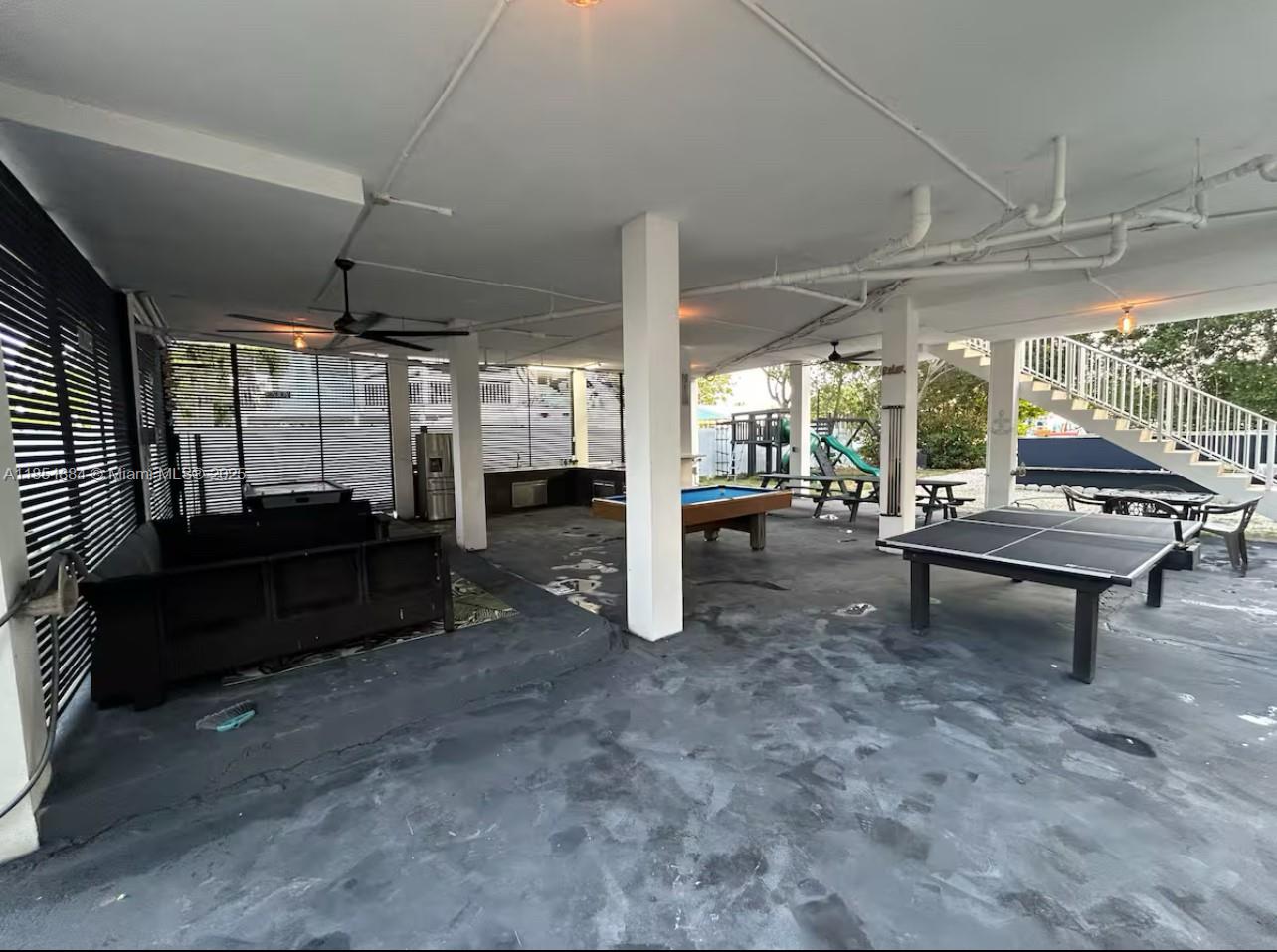 350 Hazel Street Key Largo, FL 33037 - Photo 12 of 22 a living room with lots of furniture and a large window