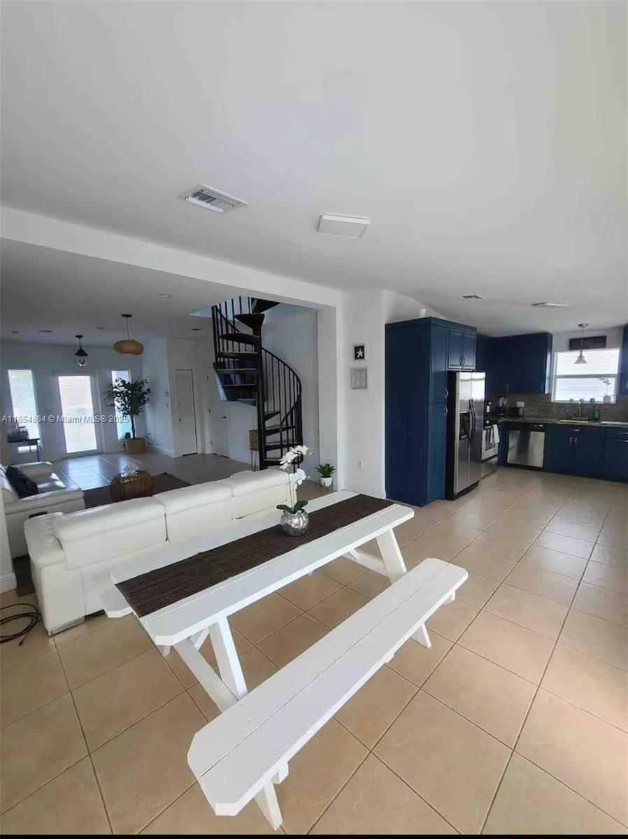 350 Hazel Street Key Largo, FL 33037 - Photo 2 of 22 a view of kitchen with furniture and refrigerator