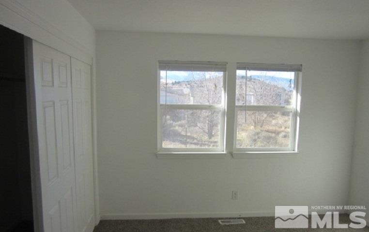 15815 Easy Street Reno, NV 89521 - Photo 10 of 13 a view of an empty room with a window