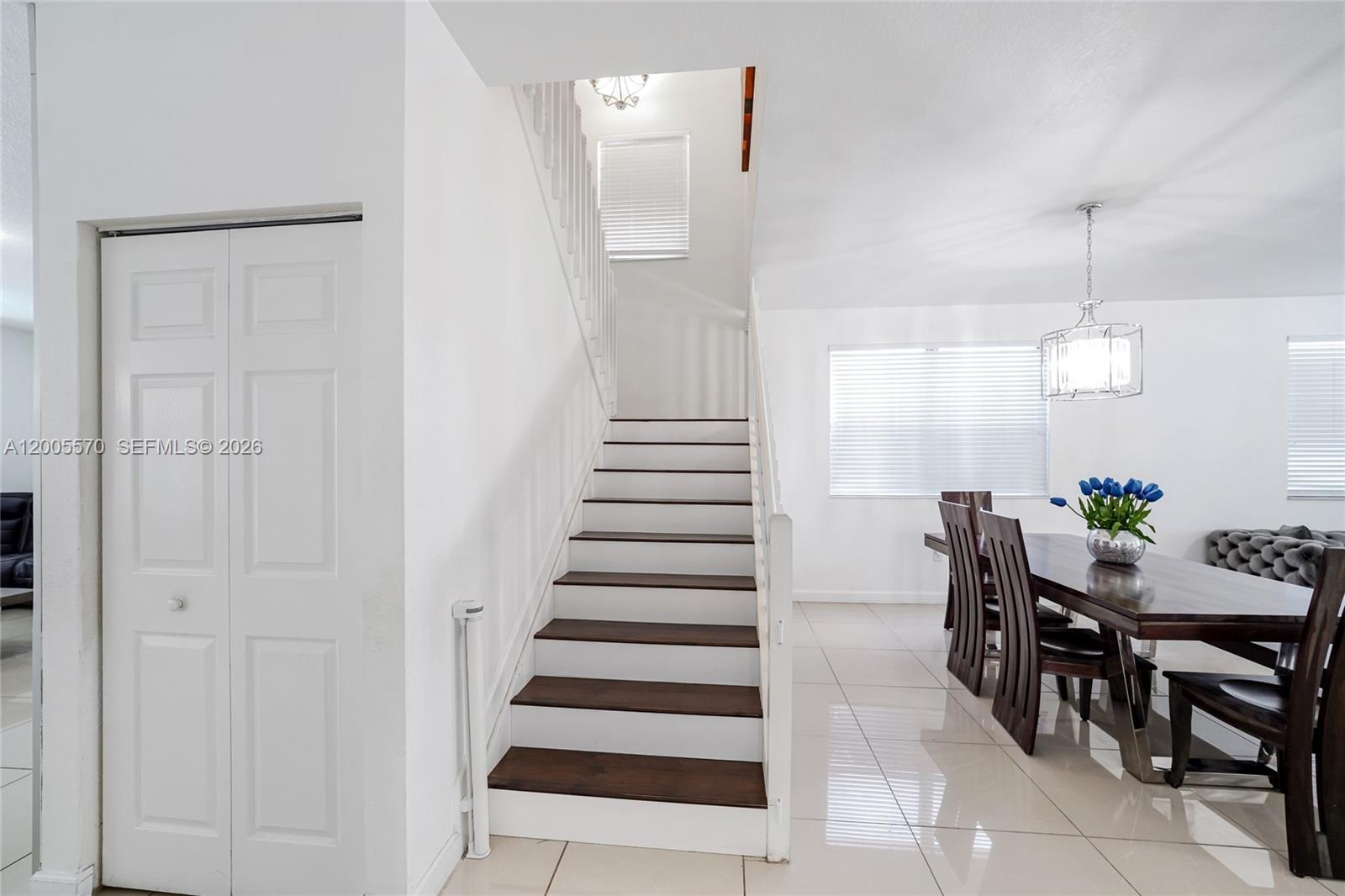 15294 Southwest 173rd Street Miami, FL 33187 - Photo 14 of 48 a view of a dining room with furniture