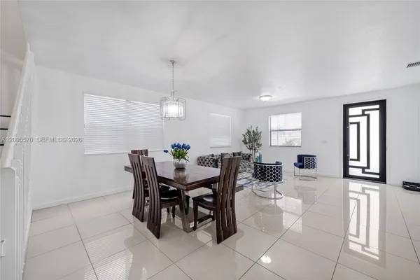 a view of a dining room with furniture