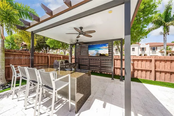a view of a porch with furniture