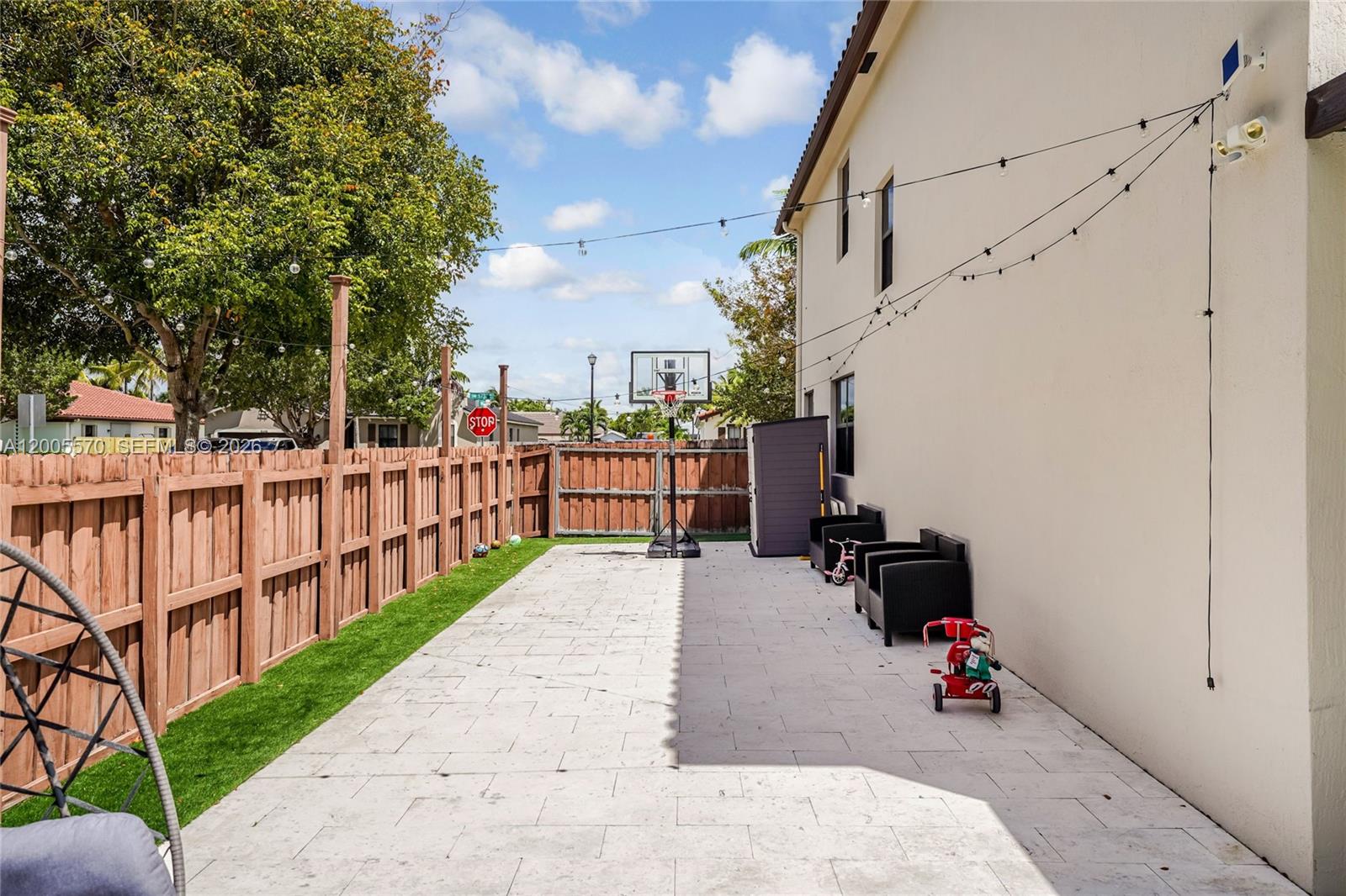 15294 Southwest 173rd Street Miami, FL 33187 - Photo 37 of 48 a view of a porch with wooden fence