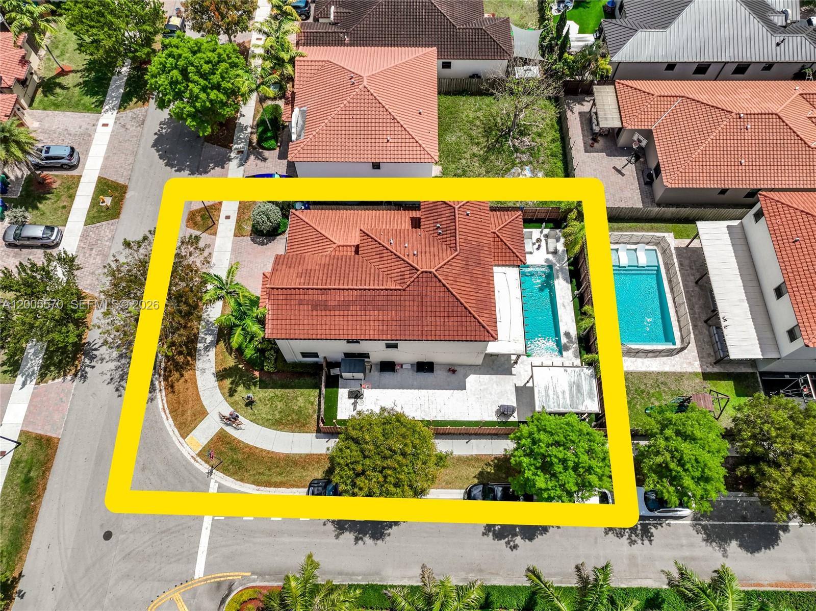 15294 Southwest 173rd Street Miami, FL 33187 - Photo 41 of 48 an aerial view of residential houses with swimming pool