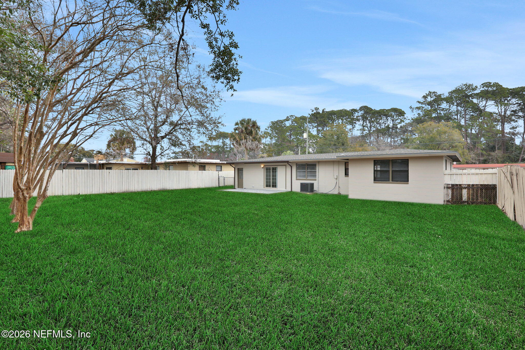 910 Nightingale Road Jacksonville, FL 32216 - Photo 31 of 41 BACKYARD - GRASS ENHANCEMENT