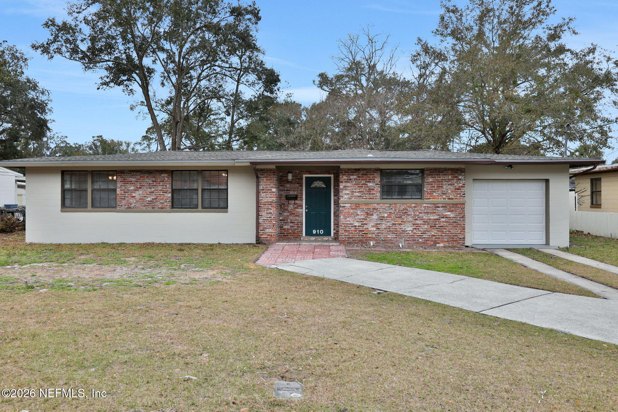910 Nightingale Road Jacksonville, FL 32216 - Photo 4 of 41 FRONT OF THE HOUSE - ORIGINAL GRASS
