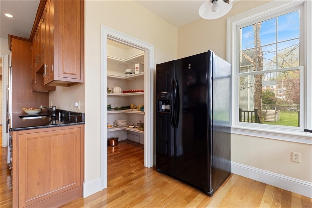 8 Middleby Road Lexington, MA 02421 - Photo 16 of 42 a kitchen with stainless steel appliances granite countertop a refrigerator and a stove