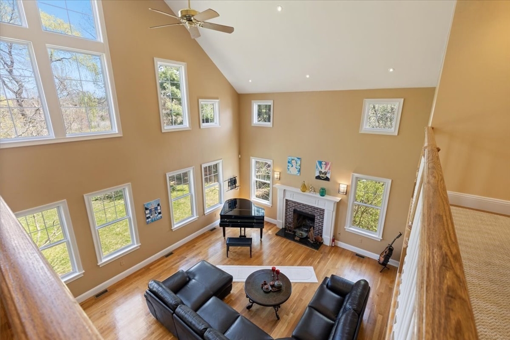 8 Middleby Road Lexington, MA 02421 - Photo 20 of 42 a living room with furniture and a wooden floor
