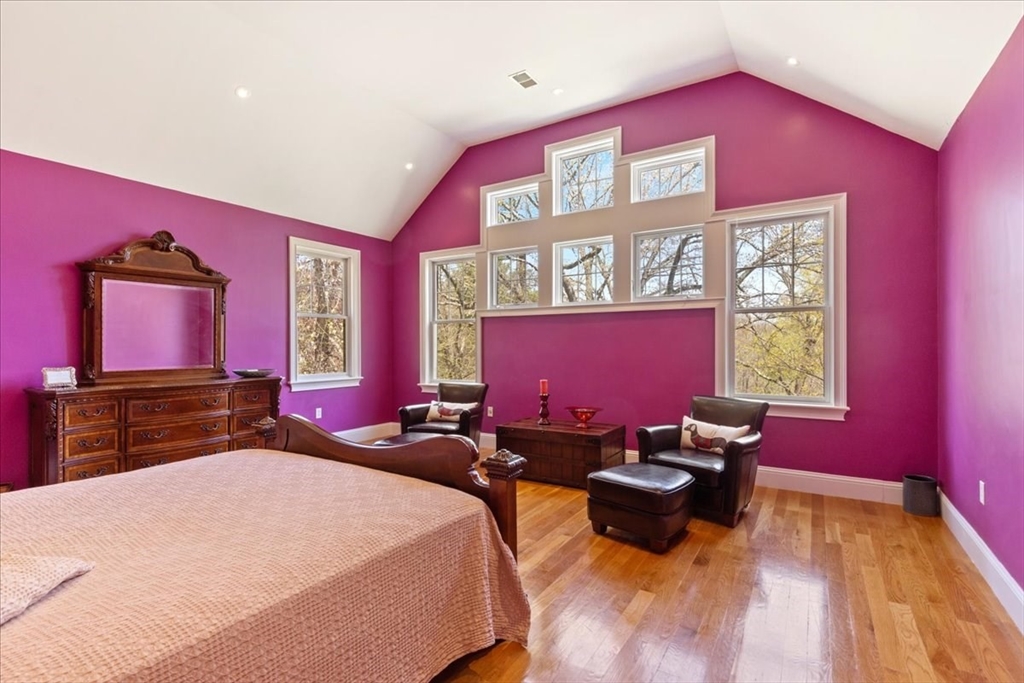 8 Middleby Road Lexington, MA 02421 - Photo 21 of 42 a bedroom with a bed and wooden floor