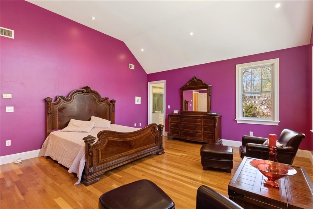 8 Middleby Road Lexington, MA 02421 - Photo 22 of 42 a bedroom with furniture and a window