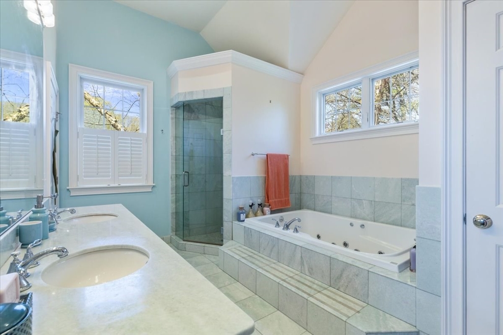 8 Middleby Road Lexington, MA 02421 - Photo 24 of 42 a bathroom with a tub and a sink