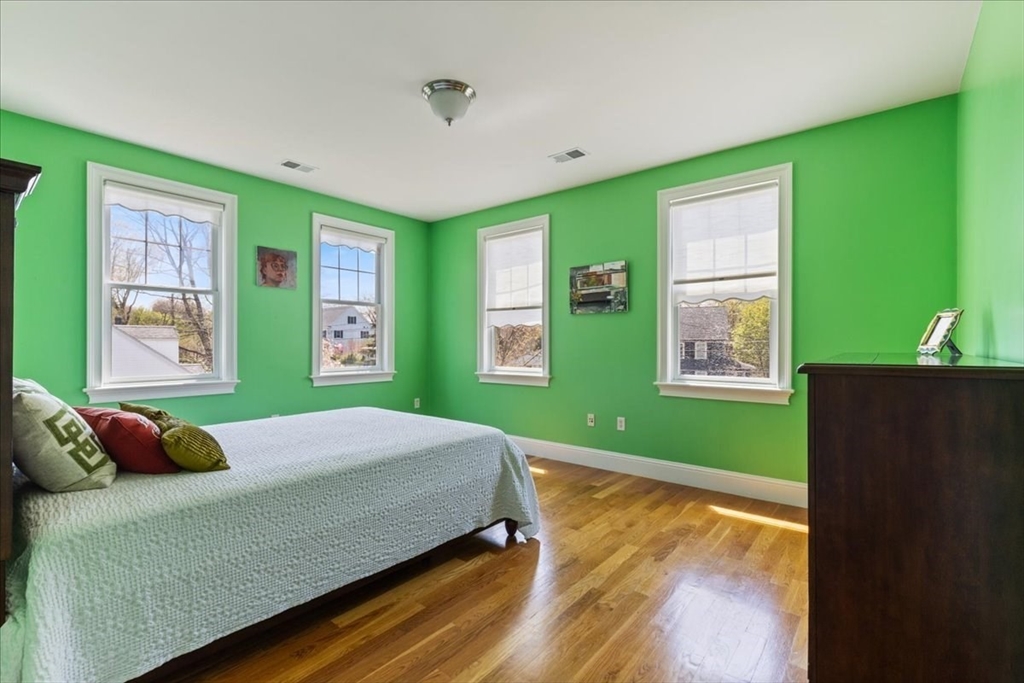 8 Middleby Road Lexington, MA 02421 - Photo 32 of 42 a bedroom with a bed and windows