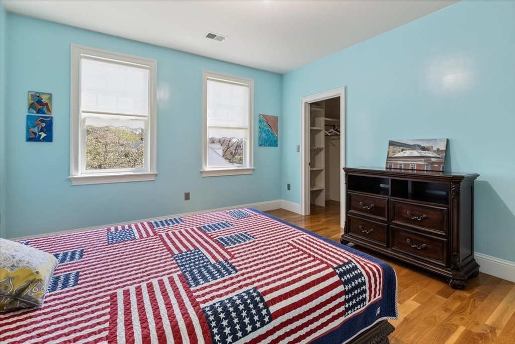 8 Middleby Road Lexington, MA 02421 - Photo 34 of 42 a bedroom with a bed and a dresser