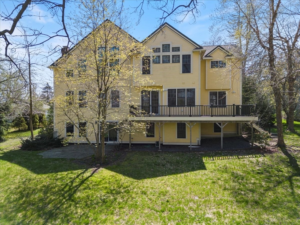 8 Middleby Road Lexington, MA 02421 - Photo 4 of 42 a front view of a house with a yard