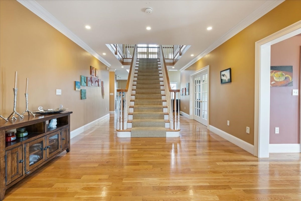 8 Middleby Road Lexington, MA 02421 - Photo 5 of 42 a view of entryway and hall with wooden floor