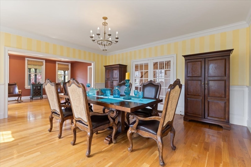 8 Middleby Road Lexington, MA 02421 - Photo 7 of 42 a view of a dining room with furniture and wooden floor
