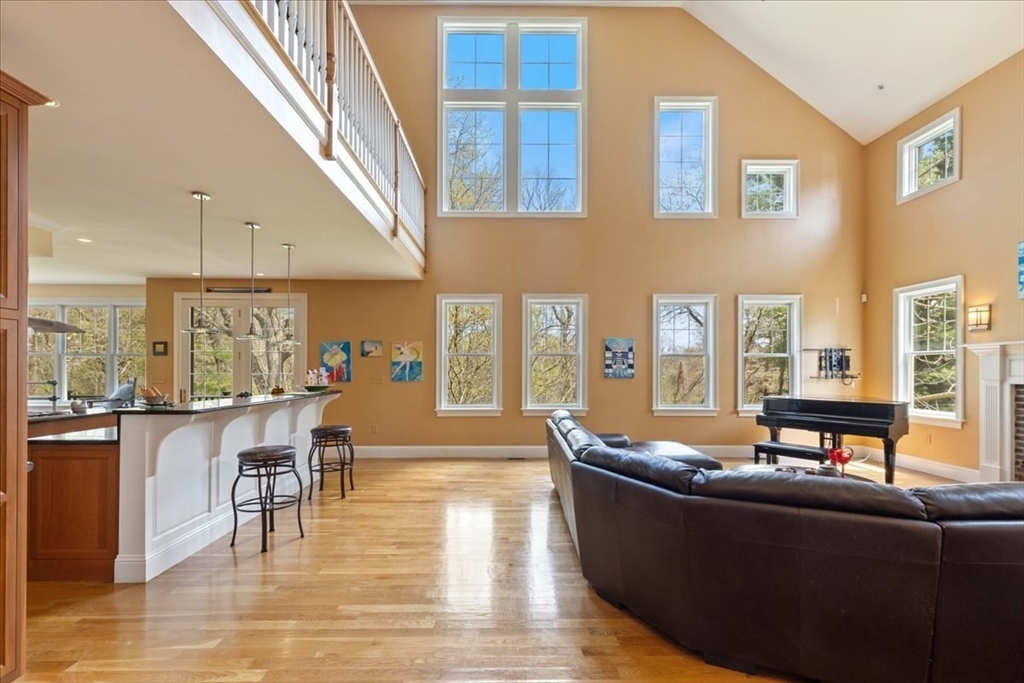 8 Middleby Road Lexington, MA 02421 - Photo 8 of 42 a living room with furniture and floor to ceiling windows