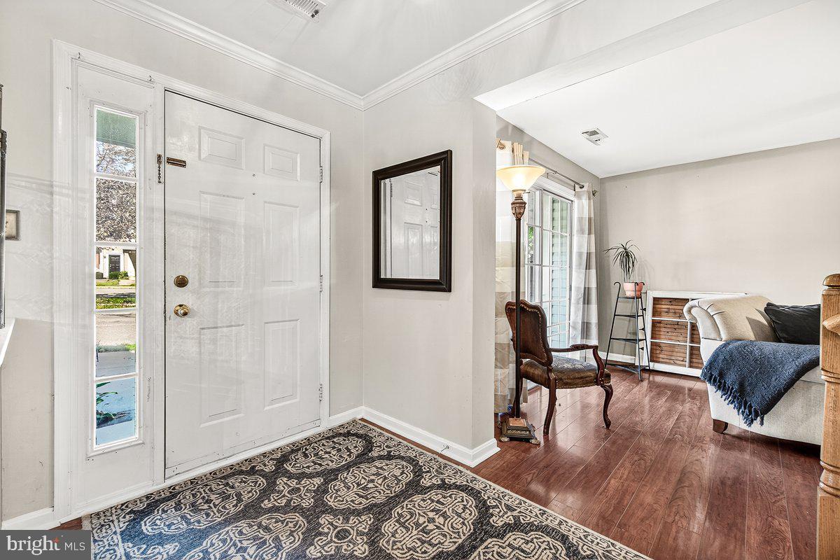 2663 South Everly Drive, Unit 75 Frederick, MD 21701 - Photo 1 of 39 a living room with furniture and a window