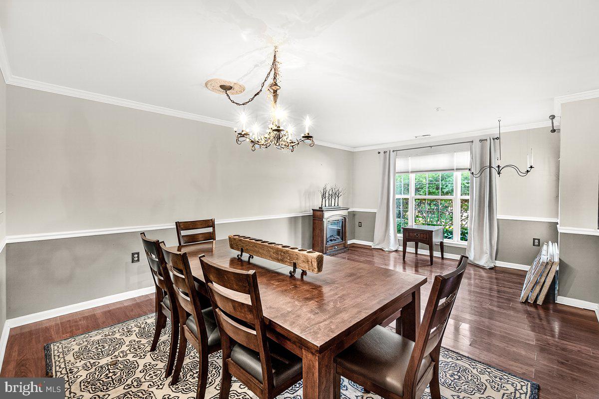 2663 South Everly Drive, Unit 75 Frederick, MD 21701 - Photo 11 of 39 a view of a dining room with furniture window and outside view