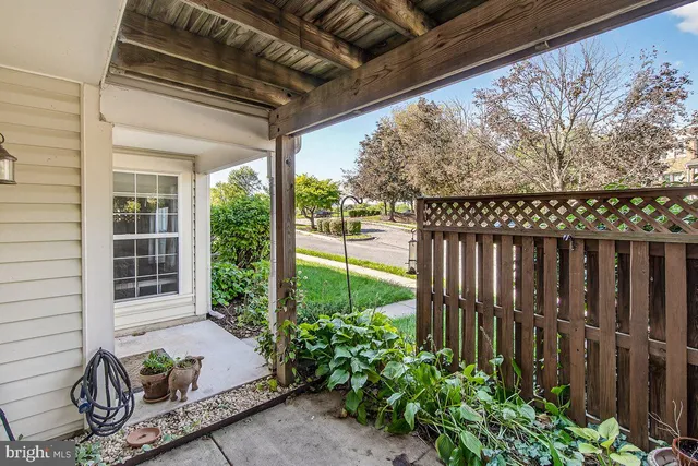 a view of a porch with furniture