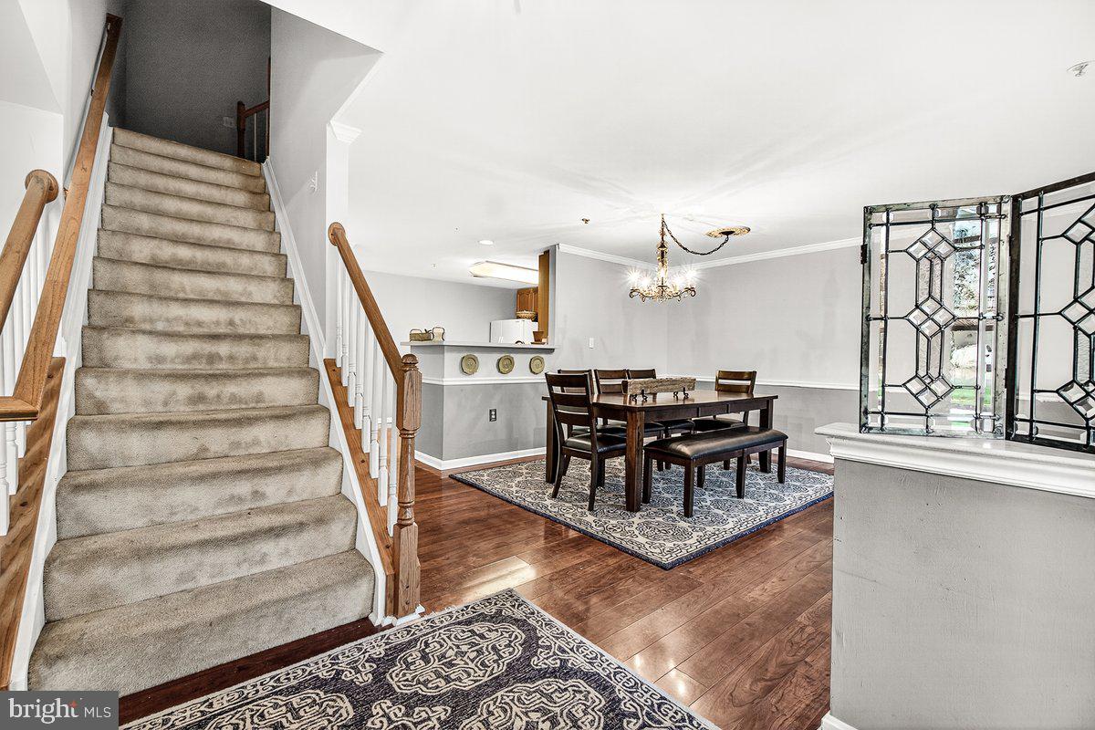 2663 South Everly Drive, Unit 75 Frederick, MD 21701 - Photo 6 of 39 a living room with furniture and a large window
