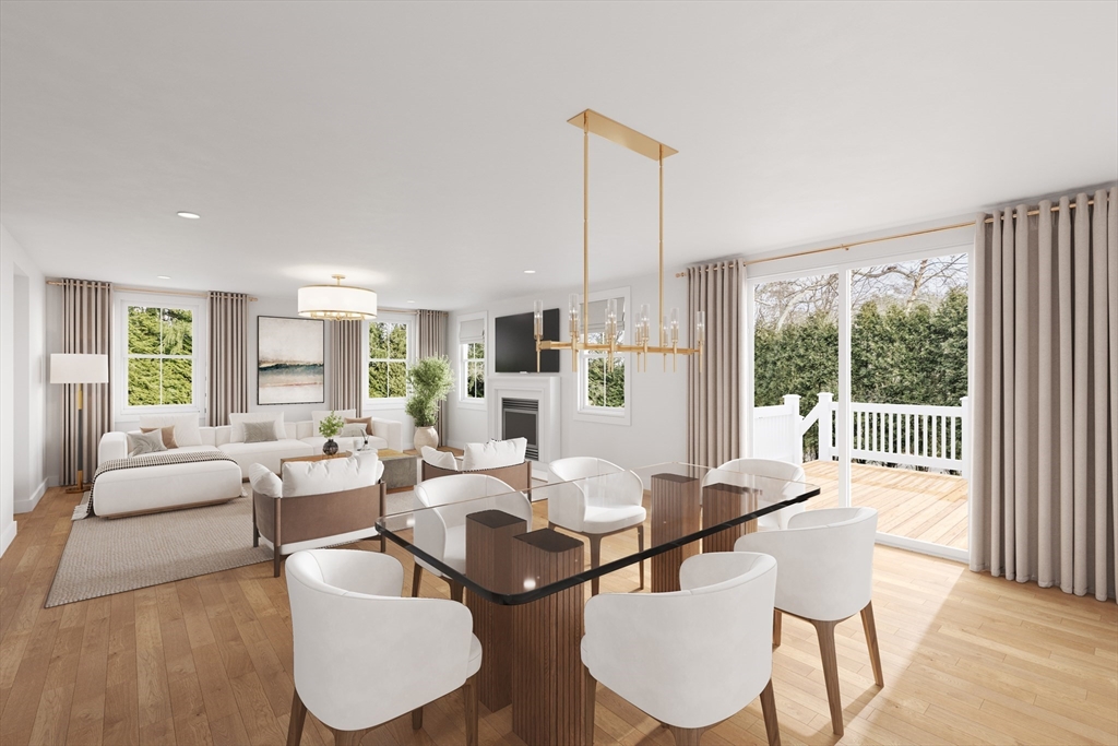 91 Oliver Pond Circle, Unit 3 Franklin, MA 02038 - Photo 3 of 7 a living room with furniture and large windows