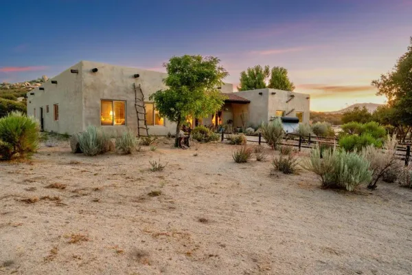 a row of car parked in front of house
