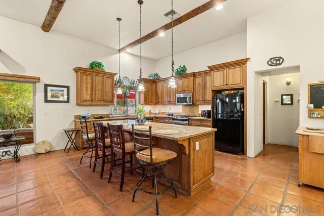 a bed room with furniture and a chandelier