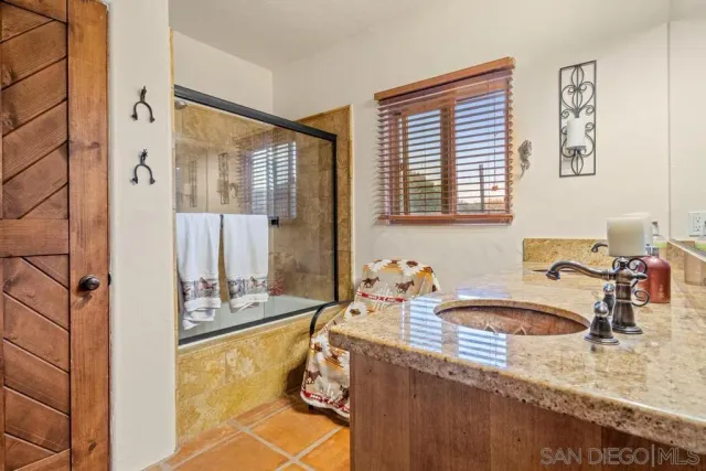 a view of a terrace with sitting area