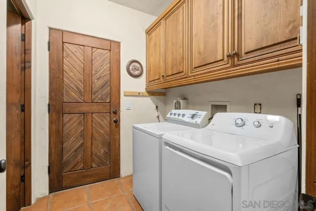 an aerial view of residential house and ocean
