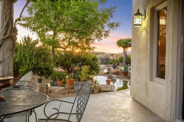 a view of a town with mountains in the background