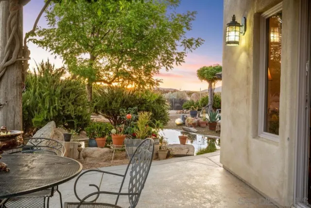 a view of a town with mountains in the background