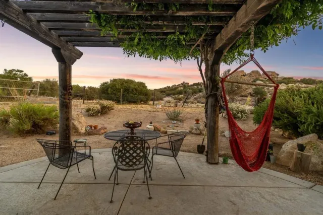 a view of a town with mountains in the background
