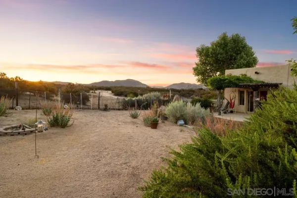 a view of mountain view with mountains in the background