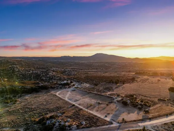 a view of a lake with mountains in the background